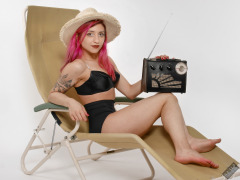 2022-07-02 Mave D models black bra top and vintage girdle worn as hotpants, whilst relaxing in vintage Relaxator 365 chair and listening to Roamer Ten radio