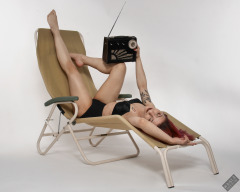 2022-07-02 Mave D models black bra top and vintage girdle worn as hotpants, whilst relaxing in vintage Relaxator 365 chair and listening to Roamer Ten radio