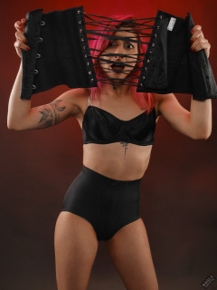 2022-07-02 Mave D models black bra and vintage girdle worn as hotpants