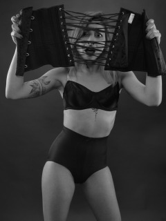 2022-07-02 Mave D models black bra and vintage girdle worn as hotpants