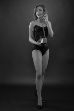 2022-07-02 Mave D in tightly-laced black underbust corset, over black bra and vintage girdle worn as hotpants