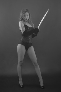 2022-07-02 Mave D in tightly-laced black underbust corset, over black bra and vintage girdle worn as hotpants