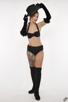 Michelle's Modelling in her own black vintage-style bikini and black suede boots