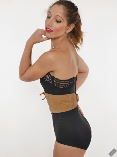 Michelle's Modelling in black strapless bra-top and matching black high-waist girdle, worn as hotpants, c/w tight leather corset-belt