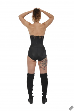 Michelle's Modelling in black strapless bra-top and matching black high-waist girdle, worn as hotpants, c/w tight leather corset-belt