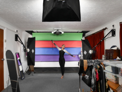 Michelle's Modelling with multicoloured backdrop, in gymnastics leotard costume