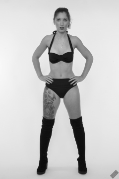 Michelle's Modelling in her own black vintage-style bikini and black suede boots