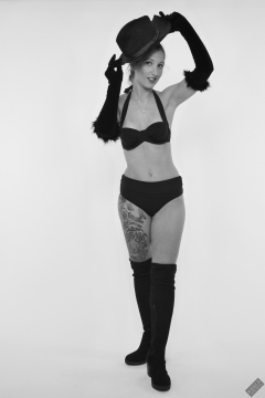 Michelle's Modelling in her own black vintage-style bikini and black suede boots