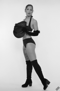 Michelle's Modelling in her own black vintage-style bikini and black suede boots