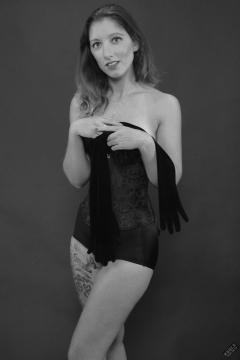 Michelle's Modelling in tightly-laced black underbust corset, worn on top of matching black bra and high waist girdle