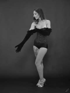 Michelle's Modelling in tightly-laced black underbust corset, worn on top of matching black bra and high waist girdle