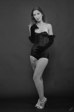 Michelle's Modelling in tightly-laced black underbust corset, worn on top of matching black bra and high waist girdle