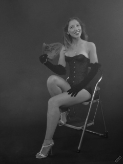 Michelle's Modelling in tightly-laced black underbust corset, worn on top of matching black bra and high waist girdle