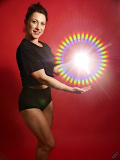 Athena Marie lit by RGB+CCT LED, in knotted T-shirt and vintage black control briefs worn as hotpants, studio shoot 2023-02-04