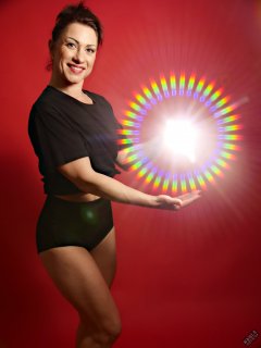 Athena Marie lit by RGB+CCT LED, in knotted T-shirt and vintage black control briefs worn as hotpants, studio shoot 2023-02-04