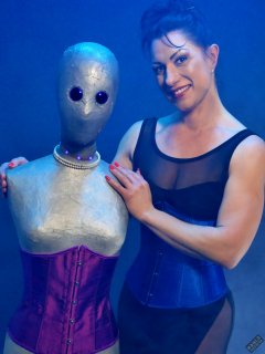 Athena Marie in leotard and tightly-laced underbust corset, studio shoot 2023-02-04