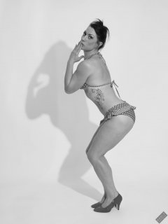 Athena Marie performs her fitness routine, in polka-dot bikini, studio shoot 2023-02-04