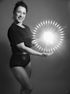 Athena Marie lit by RGB+CCT LED, in knotted T-shirt and vintage black control briefs worn as hotpants, studio shoot 2023-02-04