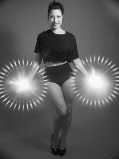 Athena Marie lit by RGB+CCT LED, in knotted T-shirt and vintage black control briefs worn as hotpants, studio shoot 2023-02-04