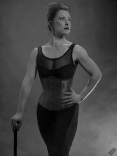 Athena Marie in leotard and tightly-laced underbust corset, studio shoot 2023-02-04