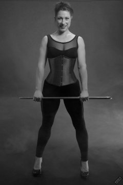 Athena Marie in leotard and tightly-laced underbust corset, studio shoot 2023-02-04
