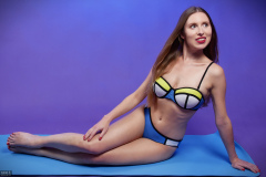 Kaya Lily in blue and yellow neoprene bikini