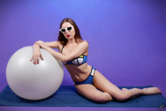 Kaya Lily in blue and yellow neoprene bikini