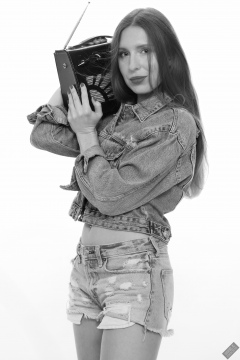 Kaya Lily in her own denim jacket and matching Daisy Duke denim shorts