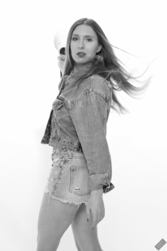 Kaya Lily in her own denim jacket and matching Daisy Duke denim shorts