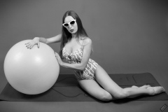 Kaya Lily in her own lime-green one-piece swimsuit