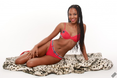 Caleann models simple red sixties-style belted bikini