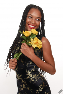 Caleann in tight black-and-gold Chinese cheongsam dress