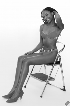 Caleann models simple red sixties-style belted bikini