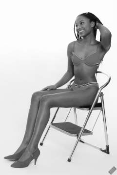 Caleann models simple red sixties-style belted bikini