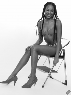 Caleann models simple red sixties-style belted bikini