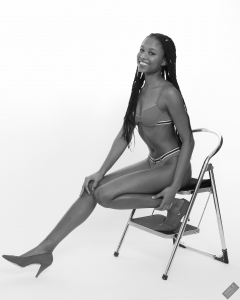 Caleann models simple red sixties-style belted bikini