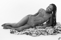 Caleann models simple red sixties-style belted bikini