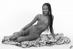 Caleann models simple red sixties-style belted bikini