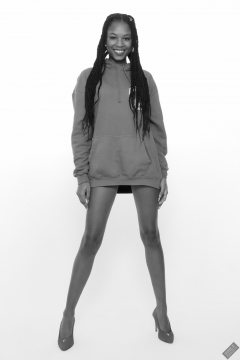 Caleann in her own blue sweatshirt, worn over red bikini