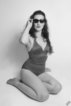 Estella Rose in vintage one-piece swimsuit