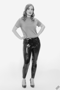 Harriet in her own T-shirt and shiny PVC trousers