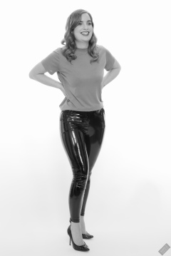 Harriet in her own T-shirt and shiny PVC trousers