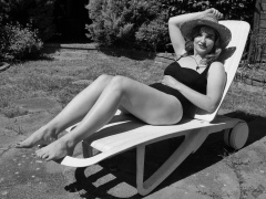 Harriet models vintage Carol Wior tummy-control one-piece swimsuit