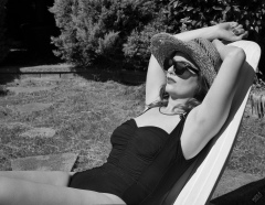 Harriet models vintage Carol Wior tummy-control one-piece swimsuit
