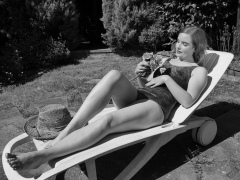 Harriet in golden retro  "Half Moon" tummy control swimsuit