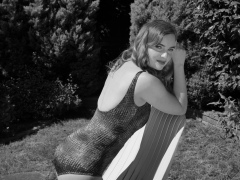 Harriet in golden retro  "Half Moon" tummy control swimsuit