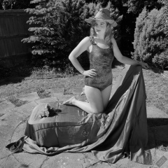 Harriet in golden retro  "Half Moon" tummy control swimsuit