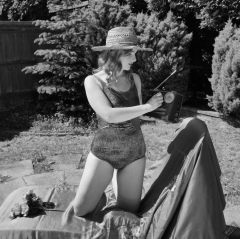 Harriet in golden retro  "Half Moon" tummy control swimsuit