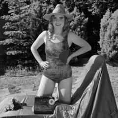 Harriet in golden retro  "Half Moon" tummy control swimsuit