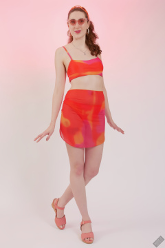 2025-06-14 Estella Rose models her own brightly coloured bikini ensemble